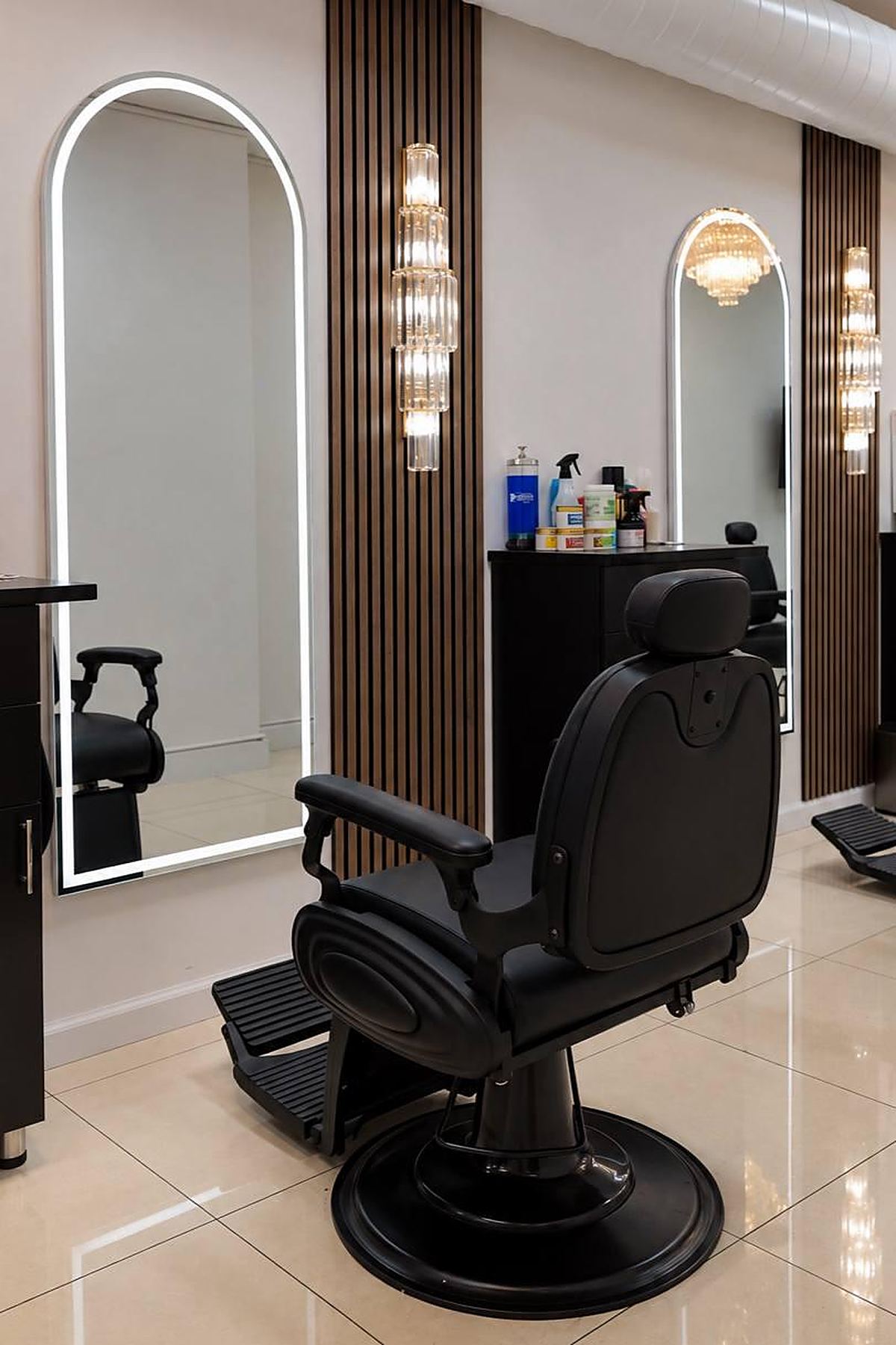 Barber chair and arched mirrors