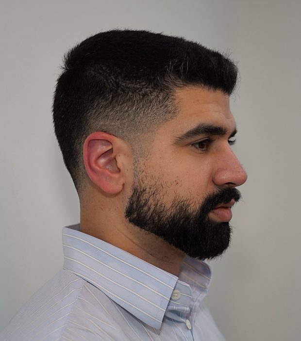 Textured square top with a mid fade and shaped full beard — haircut and beard trim at The Art of Perfection, NYC